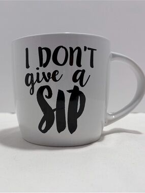White and Black Ceramic Mug with 'I Don't Give a Sip' Text